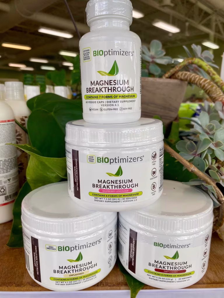Magnesium BiOptimizers bottles stacked on display.