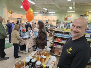 Venders chat with shoppers at a Health and Wellness Fair held in the past at Rebekah's.