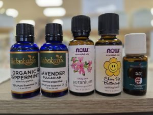 Variety of essential oil brands for sale at Rebekah's store.