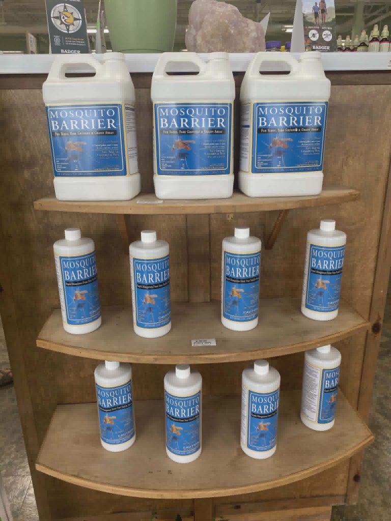 Display of mosquito barrier products in Rebekah's store.